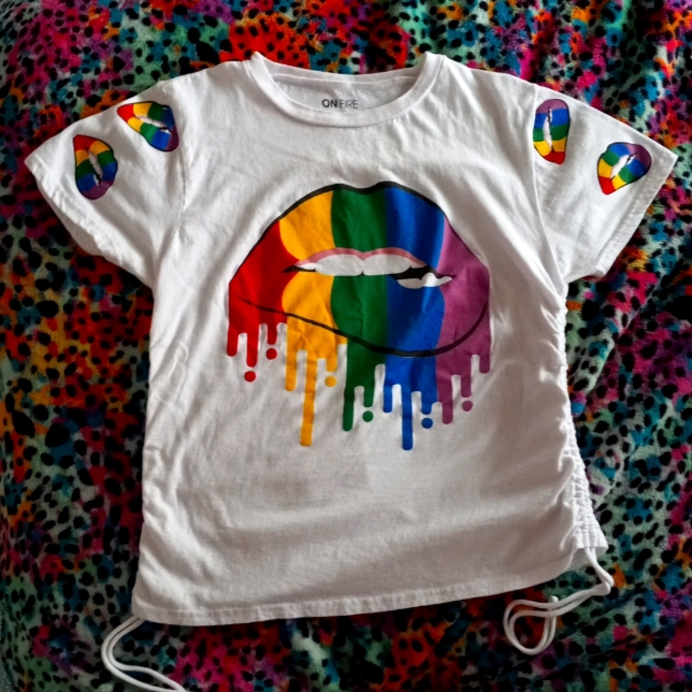 A shirt that has rainbow lips